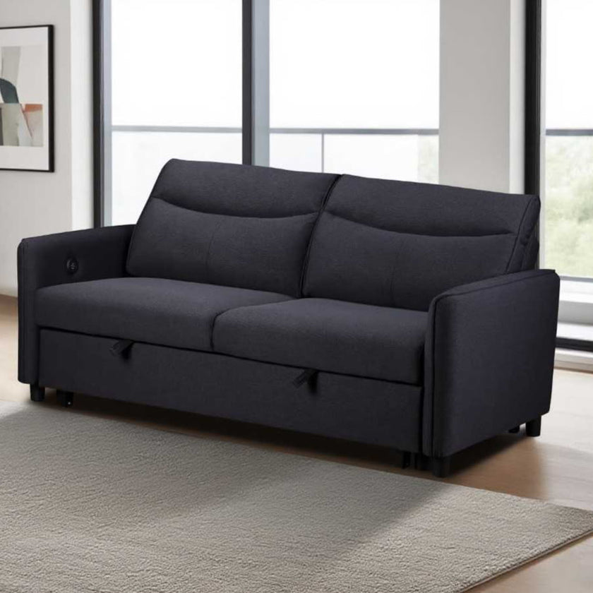 Dark Grey sofa bed in a room with large windows. Sheila Sofa bed by House of Murphy