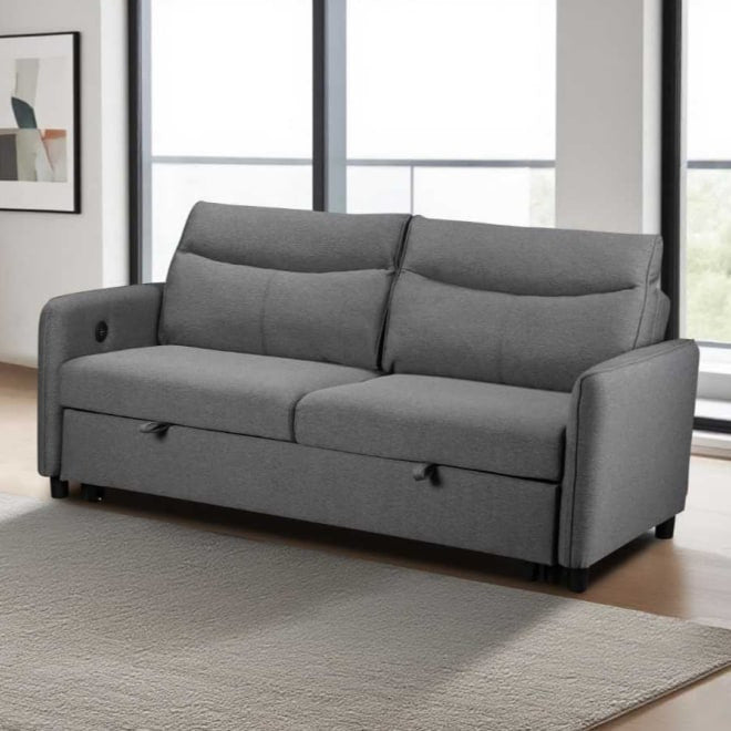 Light Gray sofa bed in a room with large windows. Shelac sofabed by House of Murphy
