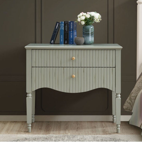Olive Green small console  with books and a vase in a bedroom setting.  Ritz small console by House of Murphy